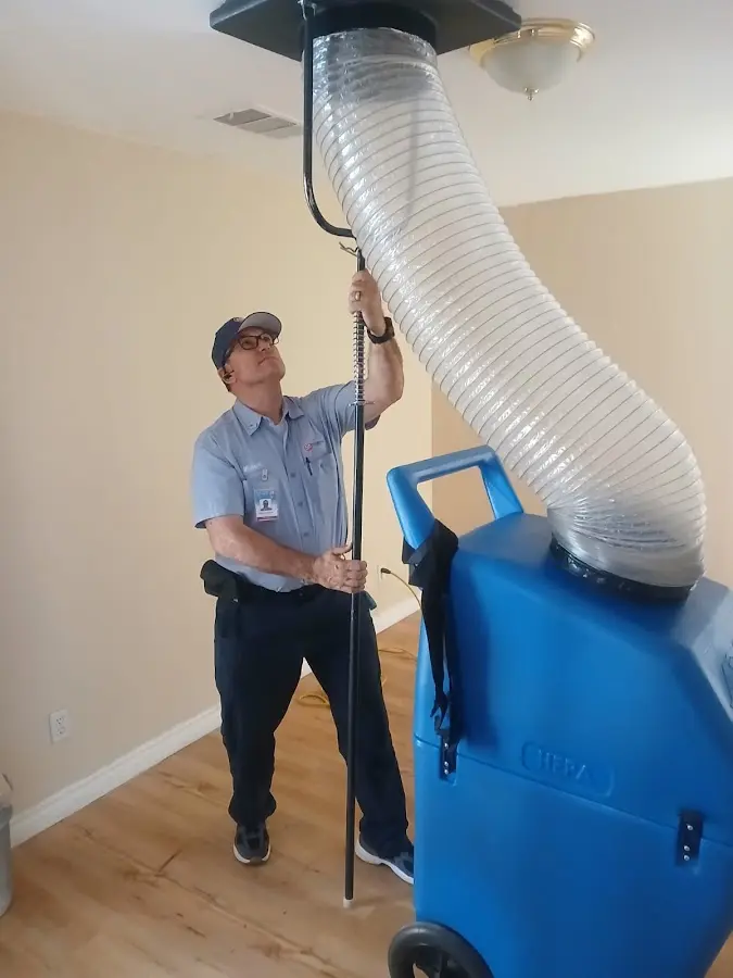 Mini Split Installation technician using HEPA equipment in Fernandina Beach
